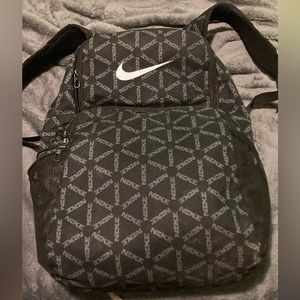 I am selling a black and gray Nike book bag . It is very spacious.
